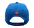 Vista trasera de gorra azul Juegos Ejército del Aire con bordado AIRE, cierre ajustable y emblema aeronáutico