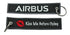 Llavero de tela Airbus Kiss Me Before Flying Negro