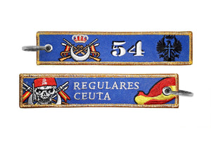 Llavero de tela Regulares Ceuta 54 Azul con bandera española bordados por delante y por detras mucha calidad calavera con cinta roja en la cabeza y escudos en los dos lados